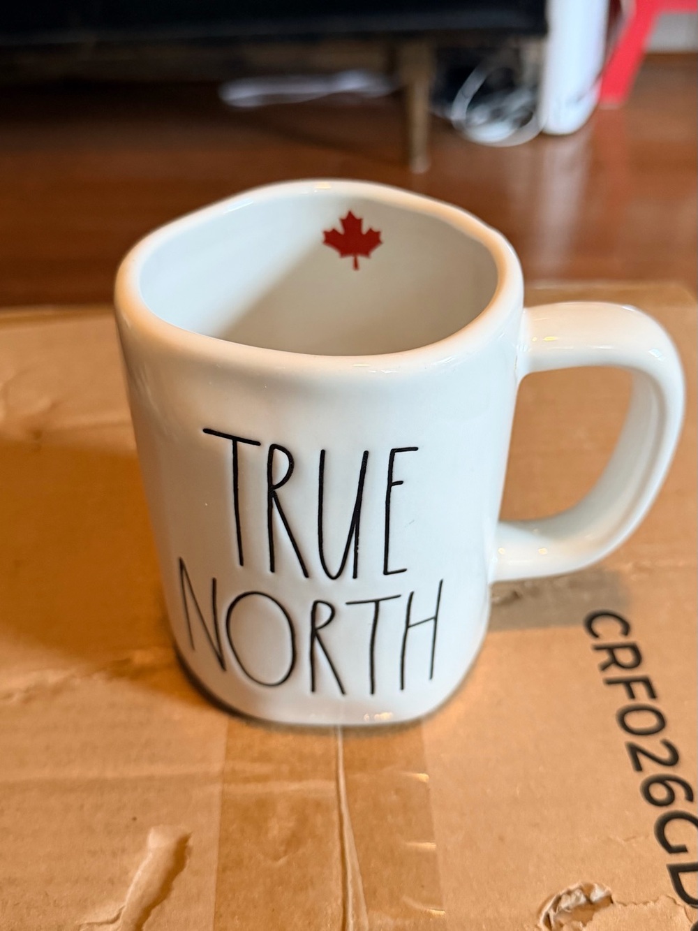 Rae Dunn White Ceramic Mug with Black Lettering and Red Maple Detail - Picture 3 of 3